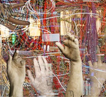 The image depicts a series of stone-like hands, fractured and cracked, reaching out in various directions from a chaotic mass of tangled wires. Some hands display broken fingers, while archival tags on others suggest anonymity and erasure. The juxtaposition of human forms and technological wires evokes themes of labor, exploitation, and the often unseen physical work behind the tech industry.